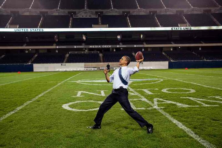 Barack Obama tosses a football on Soldier Field in Chicago on May 20, 2012. White House photo by Pete Souza.
