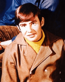 A photo of Davy Jones in the 1960s, with a mod haircut and double-breasted jacket