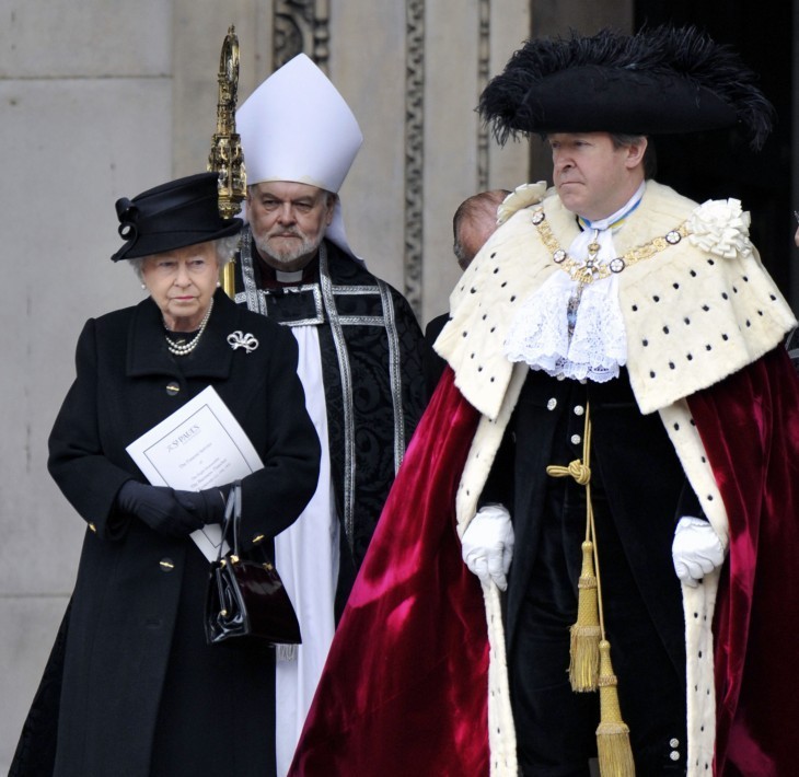 Photo of Queen Elizabeth with some kind of berobed grandee, plus a minister