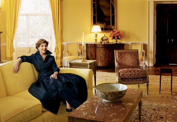 Photo of Laura Bush in Vogue, sitting in a blue gown on a yellow couch