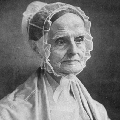 A photo of Lucretia Mott in a lace bonnet, looking sternly off-camera right