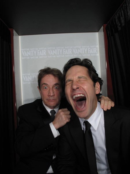 Photo: Paul Rudd laughs with mouth wide open as Martin Short mugs in the background