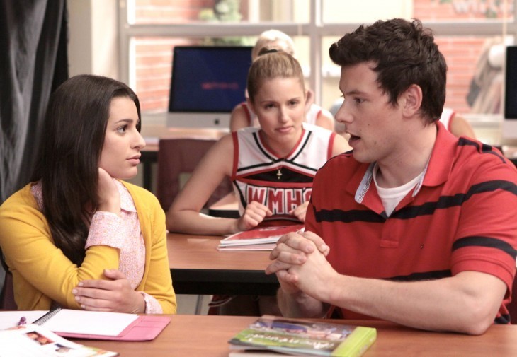 Cory Monteith photo, with him in a polo shirt talking earnestly to an attractive fellow high school student