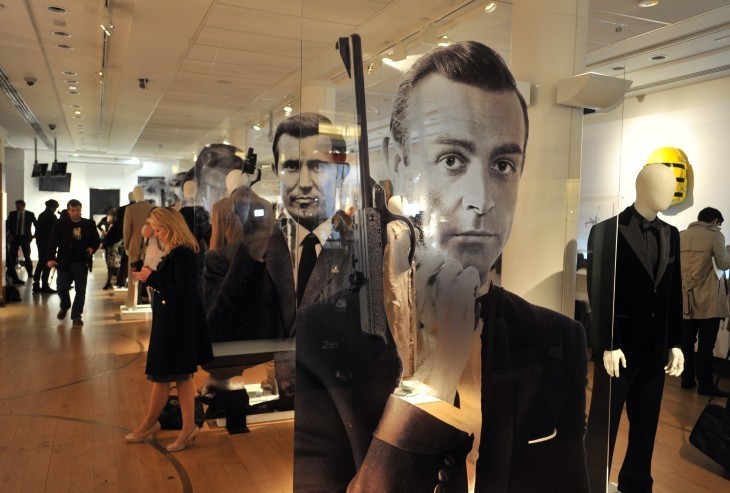 Photo of James Bond photos and other auction-type stuff on a display floor