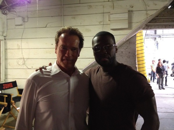 Twitter photo of Arnold Schwarzenegger with his arm around rapper 50 Cent, both smiling for the camera