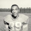 A young man in an old-fashioned football jersey with the number 39