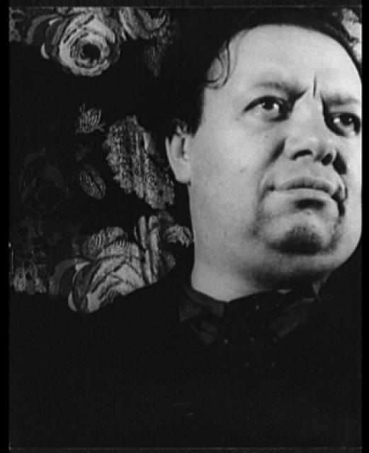 Photo of Diego Rivera in black shirt, looking to his left