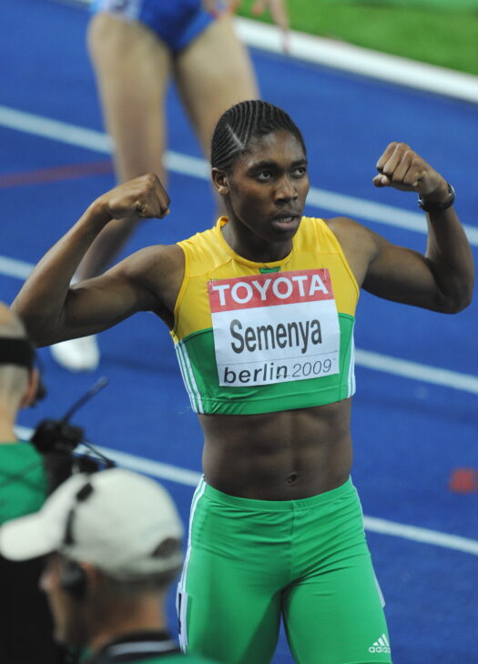 Caster Semenya flexes for cameras after her victory