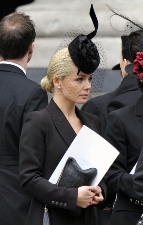 Singer Katherine Jenkins in a funeral hat with a funny black flip thingy on top