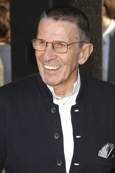 Photo of Leonard Nimoy smiling with gray hair in 2009, at a Star Trek movie opening