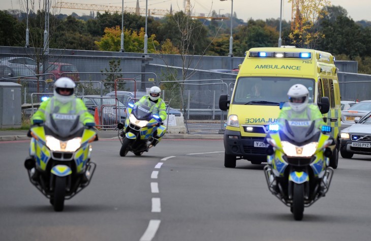 An ambulance carries Malala to the hospital