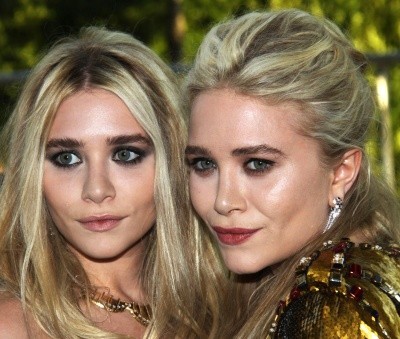 Photo of Mary-Kate and Ashley Olsen in crazy mascara and pale powder
