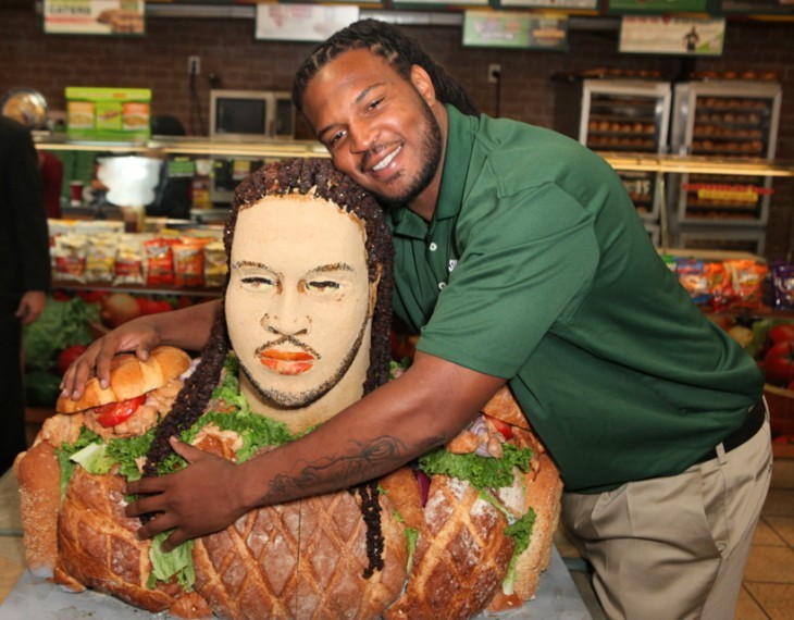 Jarvis Jones and his chicken sandwich.. er, statue. Photo by PNP/Wenn