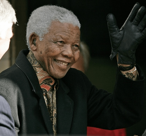 Photo of Nelson Mandela waving in Hyde Park in 2005