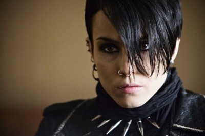 A photo of Noomi Rapace as Lisbeth Salander, with spiked collar and pasty complexion