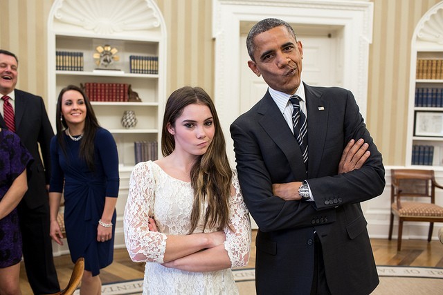 Photo of Barack Obama and McKayla Maroney, arms crossed, both with mouths pursed sideways