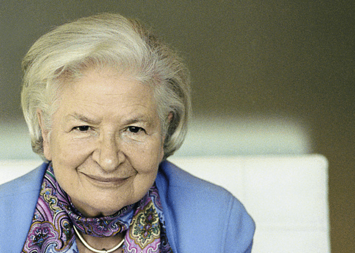 A photo of mystery author P.D. James, with tidy gray hair and a colorful scarf