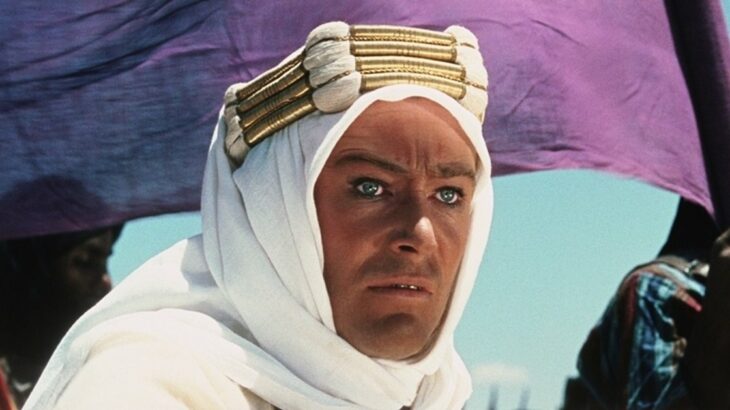 Photo of Peter O'Toole in white headdress (and blue eyes) as Lawrence of Arabia