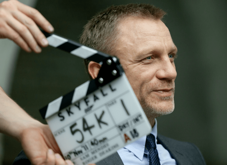 A photo of Daniel Craig smiling as a 