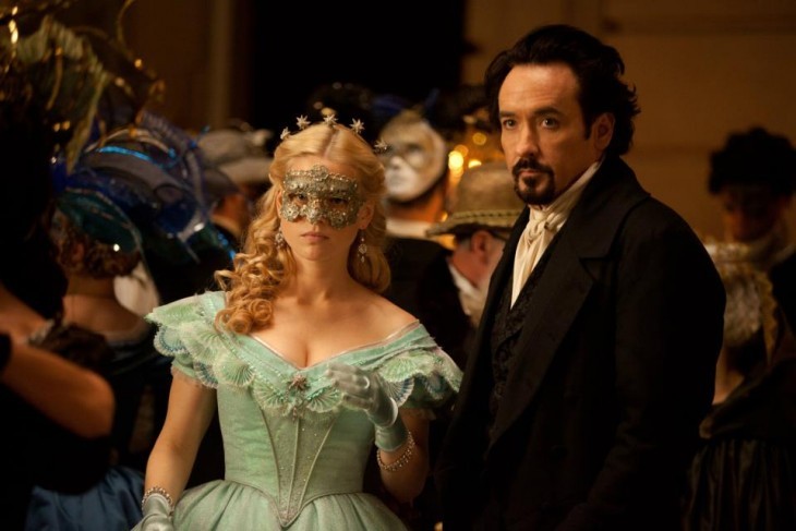A photo of Alice Eve with John Cusack dressed as Edgar Allan Poe, at a masked ball