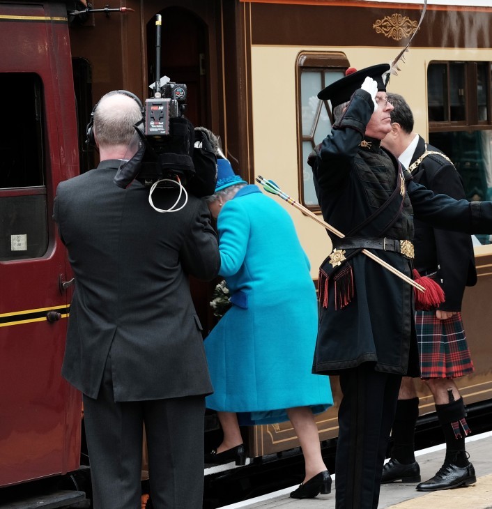 Queen Elizabeth II boards a train to Edinburgh
