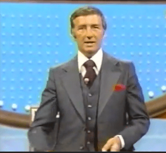 Richard Dawson photo in three-piece suit on the set of Family Feud
