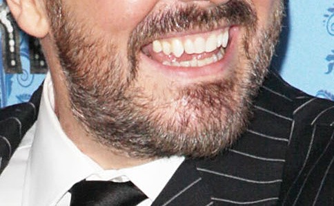 A recognizable grin, even when whiskered.