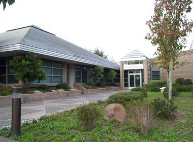 A photo of a businesslike California municipal office with a glass and metal foyer