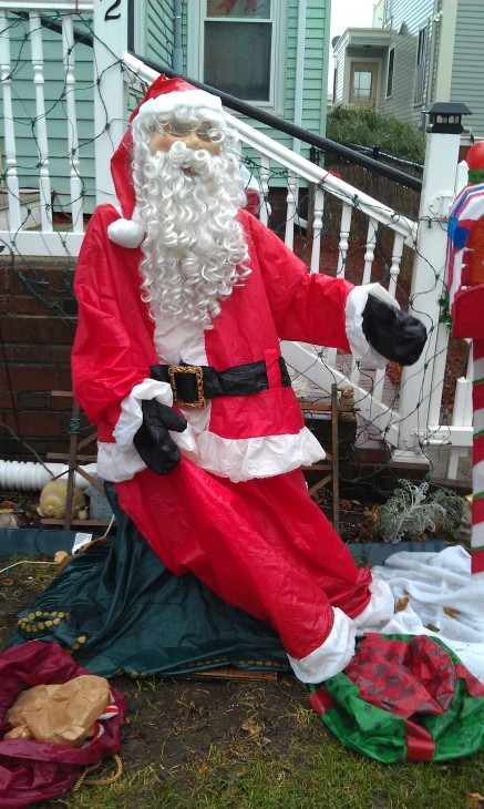 Photo of a stuffed Santa Claus in a yard