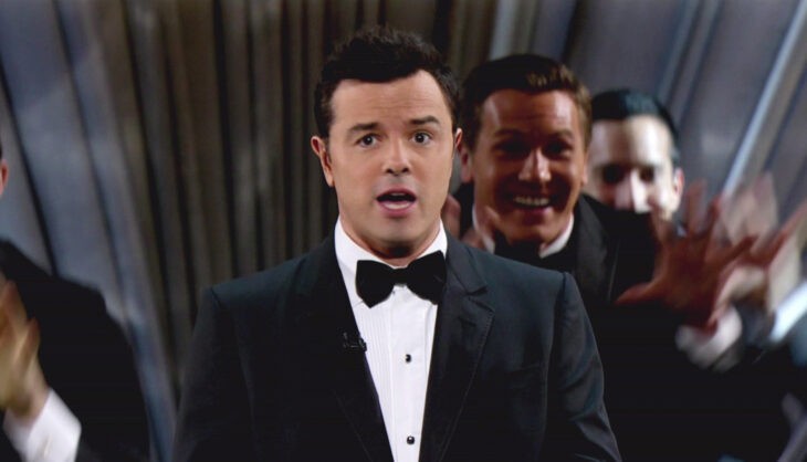Photo of Seth MacFarlane in a tuxedo, hosting the Oscars onstage