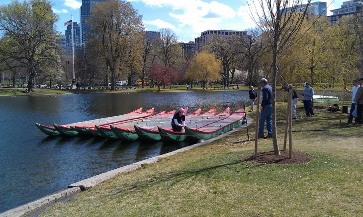 Photo of swan boat pontoons floating in the pond at Boston Common, but without benches or swans
