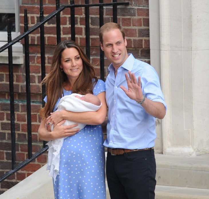 Royal baby photo with William and Kate waving to photographers with royal baby in arms