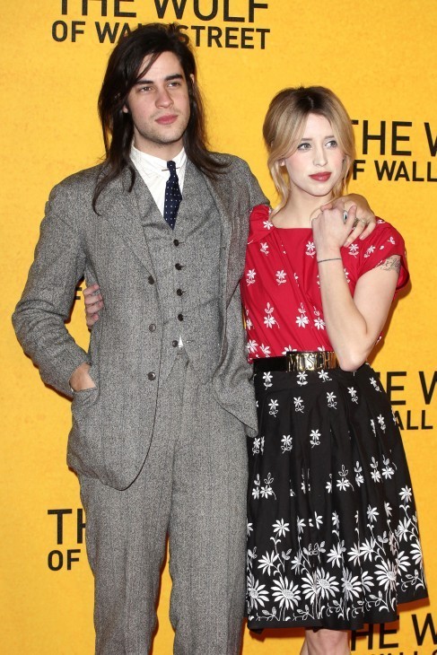 Photo of Peaches Geldof with arm around her husband, her in a peasant-type dress
