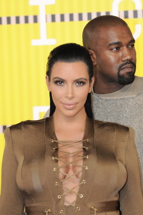 Kim Kardashian and Kanye West at the 2015 MTV Video Music Awards (VMA's) in Los Angeles on 30 Aug 2015. (WENN.com)