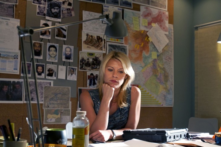 Claire Danes photo in Homeland, with her sitting in an office in front of perpetrator photos