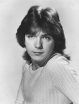 David Cassidy photo, showing off his heartthrobby looks with long brown hair parted in the middle