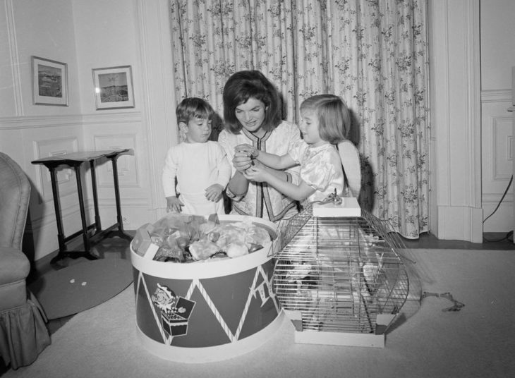 ST-A4-93-62 27 November 1962.President Kennedy, First Lady Jacqueline Kennedy (JBK), and children in White House Nursery.. [Scratches throughout the negative].Please credit "Cecil Stoughton. White House Photographs. John F. Kennedy Presidential Library and Museum, Boston"