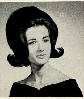 Portrait of a schoolgirl with 60's flip hairdo